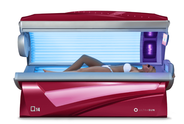 Woman laying on top of a Q14 sunbed