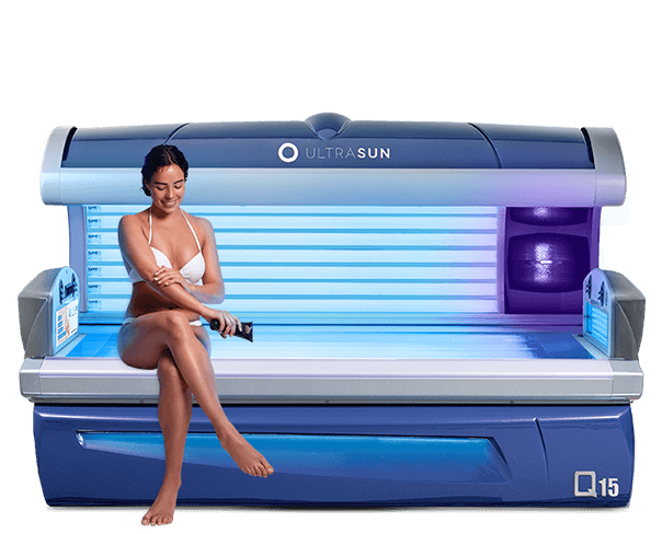 Woman sitting on top of a Q15 sunbed