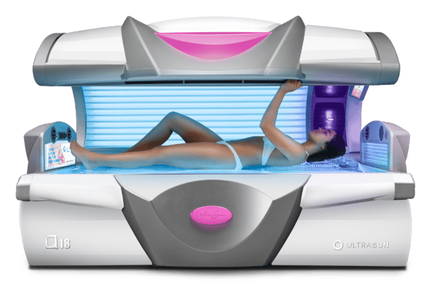 Woman laying inside a Q18 sunbed