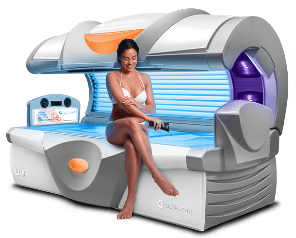 Woman sitting on the edge of a Q18 sunbed