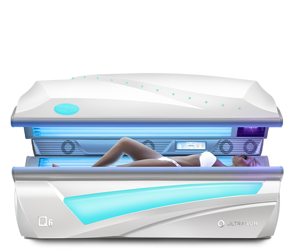 Ultrasun Q6 sunbed in Dream White Metallic with woman inside